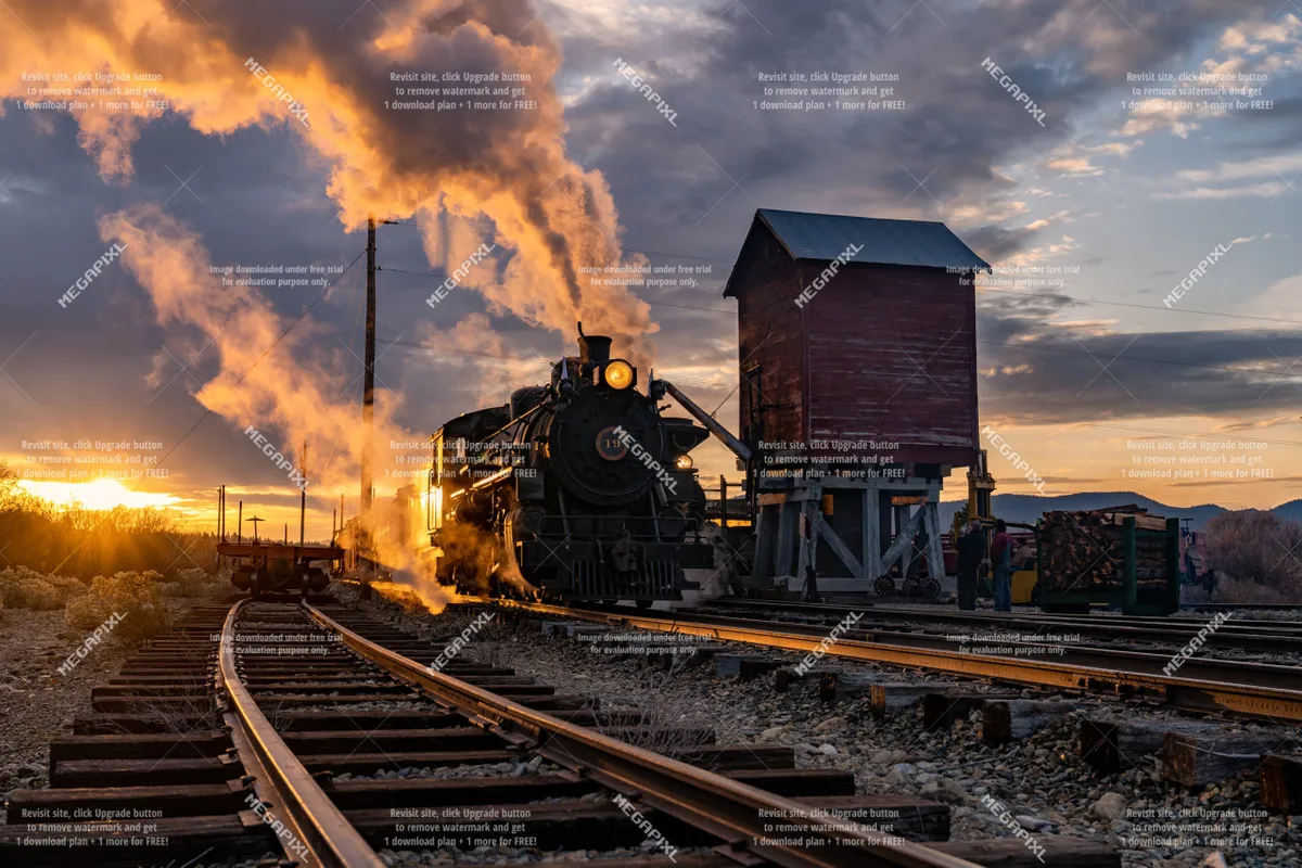 A striking view of a historic steam locomotive on railroad tracks at sunset, framed by a wooden shed and dramatic sky, evoking a sense of adventure and local exploration.